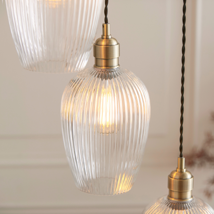 Thorlight Trentham Large 7 Light Antique Brass Stairway Cascade Light Complete With Clear Ribbed Glass Shades