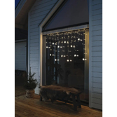 Photograph: 12 Clear Snowflakes Curtain 60 Warm White Led IP20