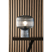 Photograph: Dar Demarius Blue Ribbed Glass Table Lamp