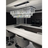 Photograph: Dar Eulalia Polished Chrome 10 Light Linear Crystal Chandelier - EUL2350