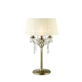 Photograph: Diyas Olivia IL30065/CR Antique Brass 3 Light Crystal Table Lamp Complete With Cream Shade