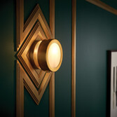 Photograph: Hinkley Mercer Small Heritage Brass Finish Round Wall Light