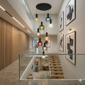 Photograph: Idolite Adele 100cm 9 Light Round Cluster Pendant Satin Black With Amber/Clear/Smoke/Petrol Blue/Moss Green/Purple Ribbed Wine Glass Shades