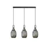 Photograph: Idolite Camille Linear 3 Light Pendant With 20cm Almond Ribbed Glass, Aged Pewter/Matt Black Smoked