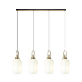 Photograph: Idolite Camille Linear 4 Light Pendant With 20cm Tubular Ribbed Glass, Brass Gold/Matt Black Opal
