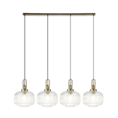 Photograph: Idolite Camille Linear Pendant, 4 x E27, Brass Gold/Matt Black With 30cm Pumpkin Shaped Ribbed Clear Glass