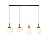 Photograph: Idolite Camille Linear Pendant 4 x E27 With Various Glasses, Brass Gold/Opal/Matt Black