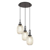 Photograph: Idolite Camille Round 3 Light Pendant With 20cm Almond Ribbed Glass, Matt Black/Matt Black Champagne