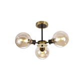 Photograph: Idolite Haughton IP Semi Ceiling, 3 x E14 With 15cm Round Glass Shade, Brass, Amber Plated & Satin Black
