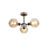 Photograph: Idolite Haughton IP Semi Ceiling, 3 x E14 With 15cm Round Segment Glass Shade, Satin Nickel, Amber Plated & Satin Black