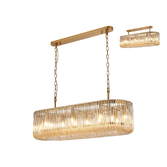 Photograph: Idolite Nuboda 100 x 35cm 14 Light Linear Oval Pendant Brass With Smoke Brown Glass Rods