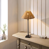 Photograph: Jericho Table Lamp Matt Black With Warm Brown Rattan Shade