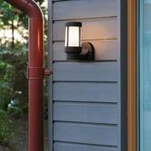 Photograph: Konstsmide Siena Matt Black Exterior Wall Light Complete With Opal Acrylic Lens