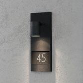 Photograph: Kosnstmide Modena Downward Facing Matt Black Exterior Wall Light Complete With Numbers