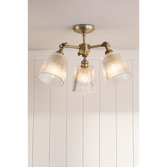 Photograph: Laura Ashley Callaghan 3 Light Semi-Flush Matt Antique Brass and Ribbed Glass