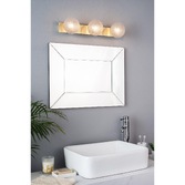 Photograph: Laura Ashley Prague 3 Light Bathroom Wall Light In Satin Brass With Textured Glass Globes - IP44