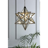 Photograph: Laura Ashley Small Star Pendant In Polished Silver With Clear Glass Panels