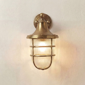 Photograph: Navigator Grand Tiller Raw Brass Downard Facing Wall Light With Clear Ribbed Glass - IP64, Solid Brass, Coastal