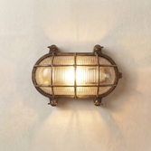 Photograph: Navigator Horatio Antique Brass Oval Bulkhead - IP64, Solid Brass, Coastal