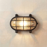 Photograph: Navigator Horatio Black Oval Bulkhead - IP64, Solid Brass, Coastal