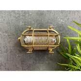 Photograph: Navigator Horatio Junior Raw Brass Oval Bulkhead - IP64, Solid Brass, Coastal