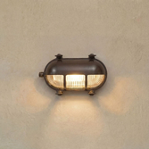 Photograph: Navigator Palaemon Antique Brass Eyelid Oval Bulkhead - IP64, Solid Brass, Coastal