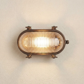 Photograph: Navigator Small Siren Antique Brass Oval Bulkhead - IP64, Solid Brass, Coastal