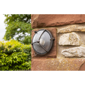 Photograph: Navigator Trident Antique Brass Circular Bulkhead - IP64, Solid Brass, Coastal