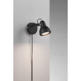 Photograph: Nordlux Aslak Black Adjustable Plug In Wall Light