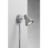 Photograph: Nordlux Eik Grey Adjustable Plug In Wall Light