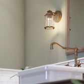 Photograph: Quintiesse Ashland Bay 1 Light Bathroom Wall Light In Natural Brass Finish Complete With Clear Seeded Glass - IP44 - QN-ASHLANDBAY1-NBR-BATH