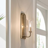 Photograph: Quintiesse Kimrose 1 Light Wall Light In Brushed Natural Brass Complete With Gently RIbbed Clear Glass Shade - QN-KIMROSE1-BNB