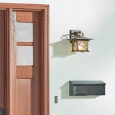 Photograph: Quintiesse Morris Medium 1 Light Outdoor Wall Lantern In Distressed Copper Finish Complete WIth iridized Seeded Glass - IP44 - QN-MORRIS-M