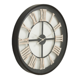 Photograph: Round Skeleton Clock With White Roman Numerals And Black Frame