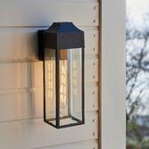 Photograph: Thorlight Geneina Matt Black Exterior Wall Light With Clear Glass Panels