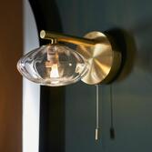 Photograph: Thorlight Lux Single Bathroom Wall Light Satin Brushed Brass With Clear Ribbed Glass Shade - IP44