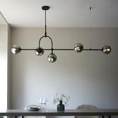 Photograph: Thorlight Merlin 5 Light Linear Bar Pendant Black With Smoked Glass Globes