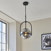 Photograph: Thorlight Merlin Single Pendant Light Black With Smoked Glass Globe