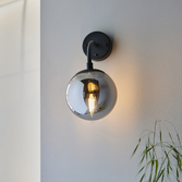 Photograph: Thorlight Merlin Single Wall Light Black With Smoked Glass Globe