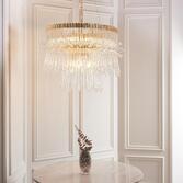 Photograph: Thorlight Orson Polished Gold 9 Light Pendant Complete With Clear Glass Rods