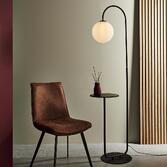 Photograph: Thorlight Phoenix Satin Black Painted Floor Lamp With Opal Glass Globe and Table