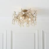 Photograph: Thorlight Tova Aged Gold Finish 3 Light Semi Flush Ceiling Light Complete With Champagne Glass Teardrops