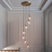 Photograph: Thorlight Trentham Large 7 Light Antique Brass Stairway Cascade Light Complete With Clear Glass Shades