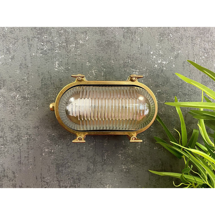 Navigator Small Siren Raw Brass Oval Bulkhead - IP64, Solid Brass, Coastal