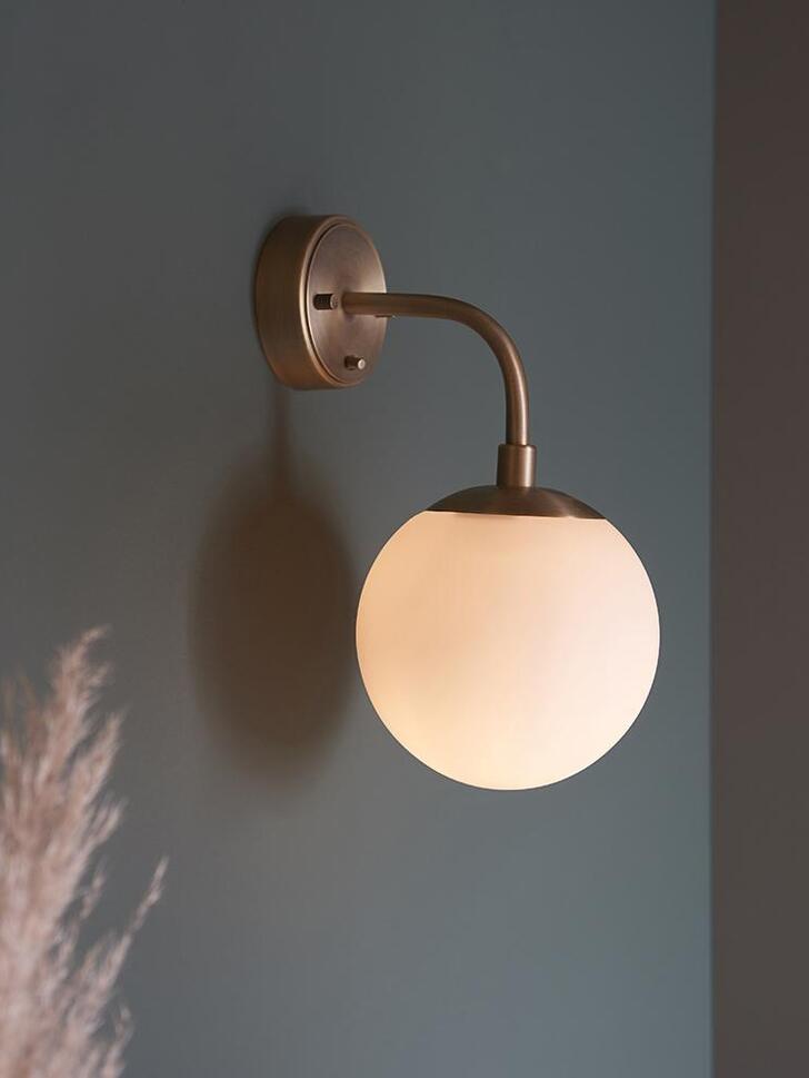 Thorlight Merlin Matt Antique Brass Finish Single Wall Light Complete With Opal Glass Globe