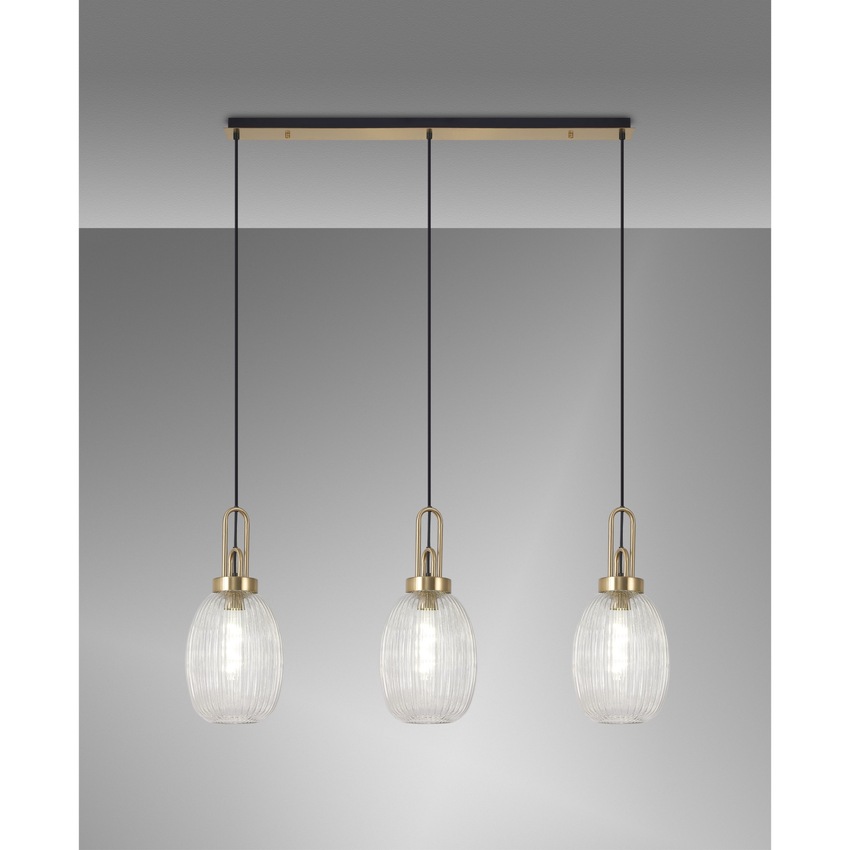 Photograph: Idolite Camille Linear 3 Light Pendant E27 With 20cm Almond Ribbed Glass, Clear Brass Gold/Matt Black
