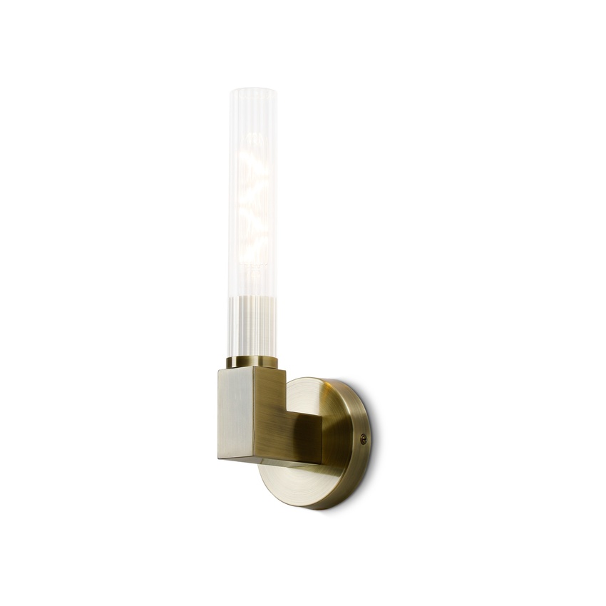 Photograph: Idolite Carey Antique Brass Bathroom Wall Light With Clear Ribbed Glass Shade - IP44