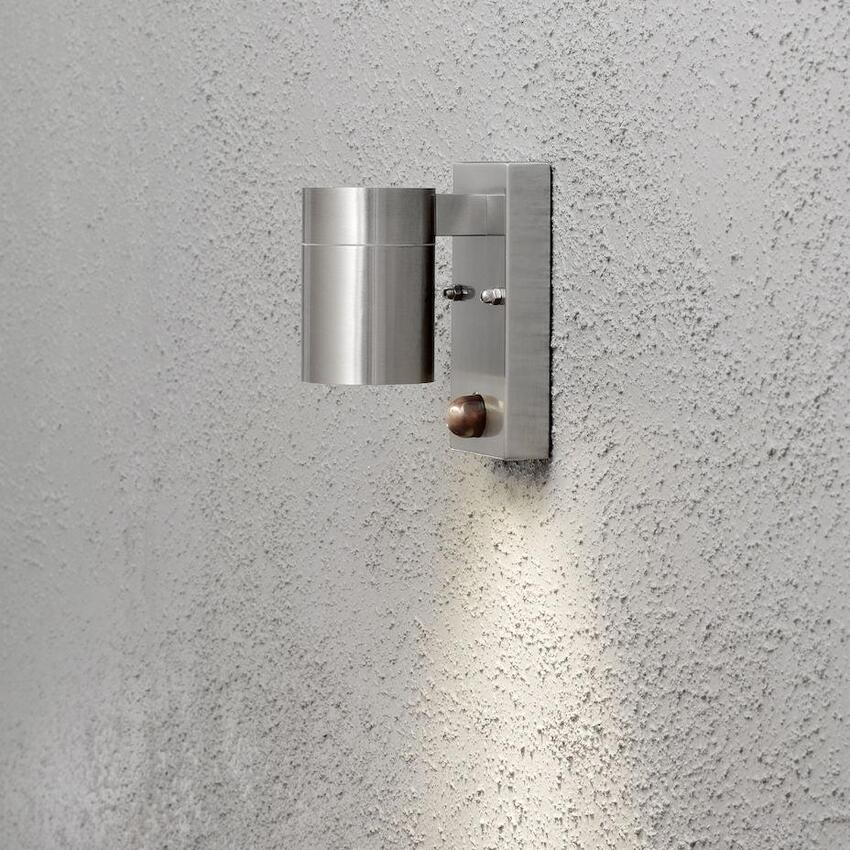 Photograph: Konstsmide Modena Stainless Steel Downward Facing Exterior Wall Light Complete With Pir