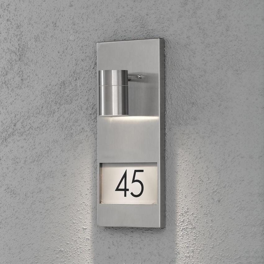 Photograph: Kosnstmide Modena Downward Facing Stainless Steel Exterior Wall Light Complete With Numbers