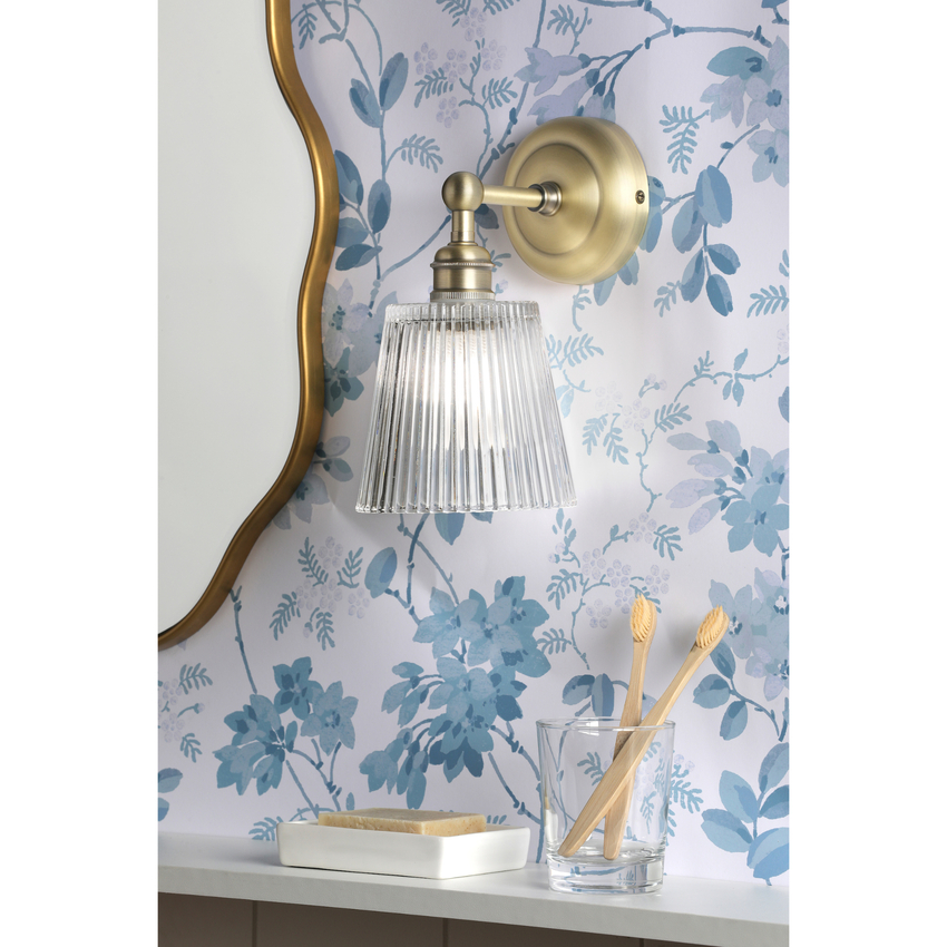 Photograph: Laura Ashley Callaghan Bathroom Wall Light Matt Antique Brass and Ribbed Glass IP44